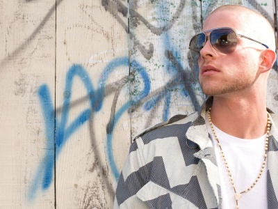 Collie Buddz Glasses Chain Fence Graffiti