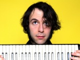 Daedelus Face Keys Hands Look