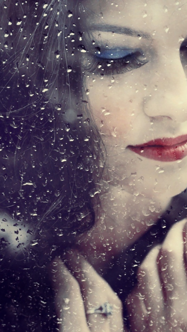 Beautiful Brunette Window Rain Drops Photo