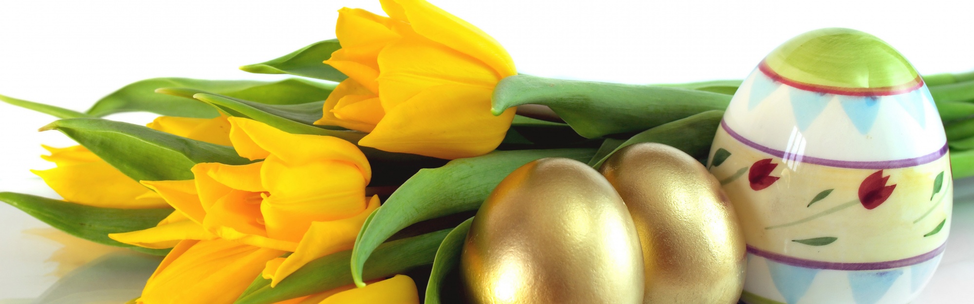 Easter Eggs And Yellow Tulips