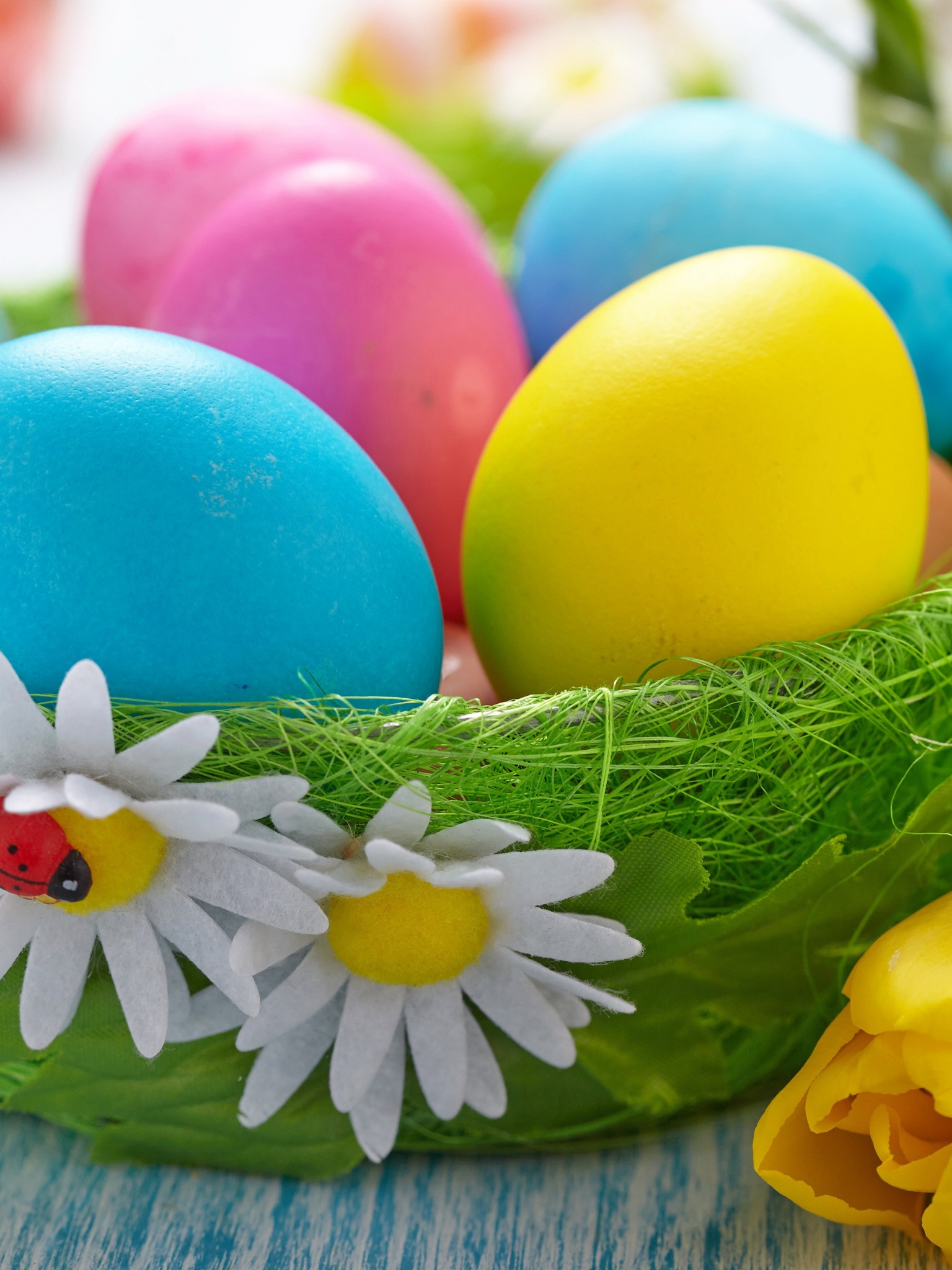 Easter Eggs In A Green Basket