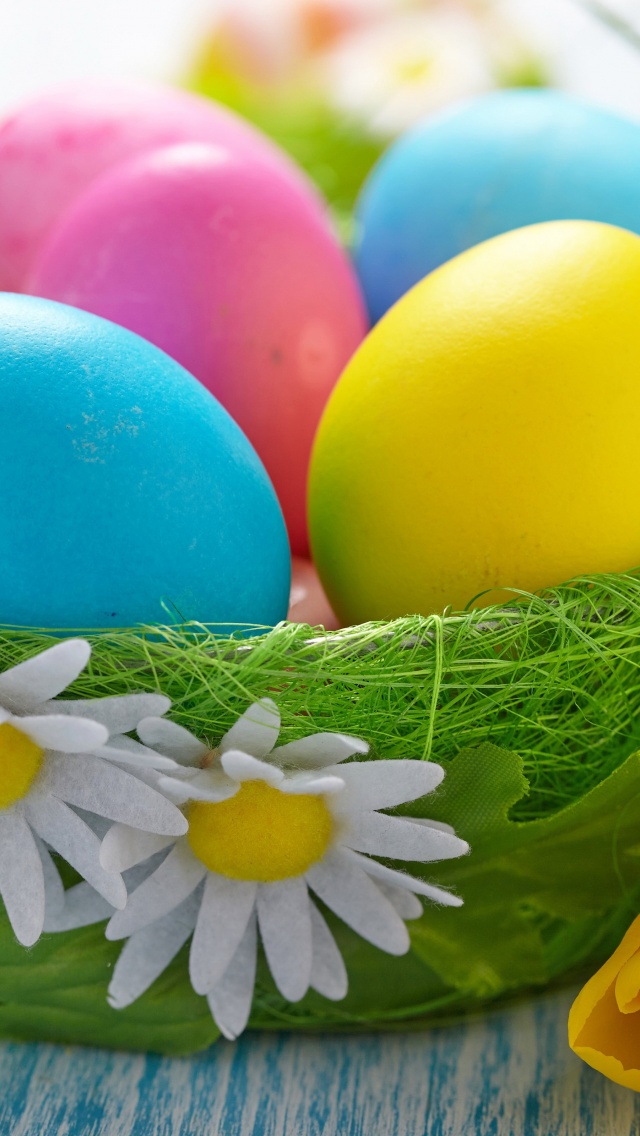 Easter Eggs In A Green Basket