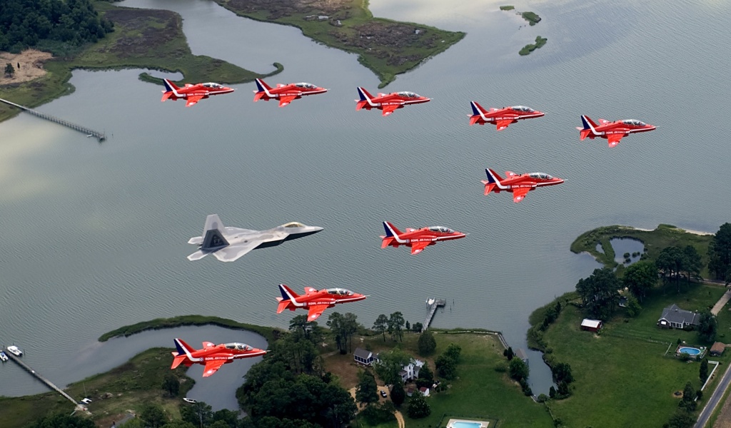 F22 And Red Arrows