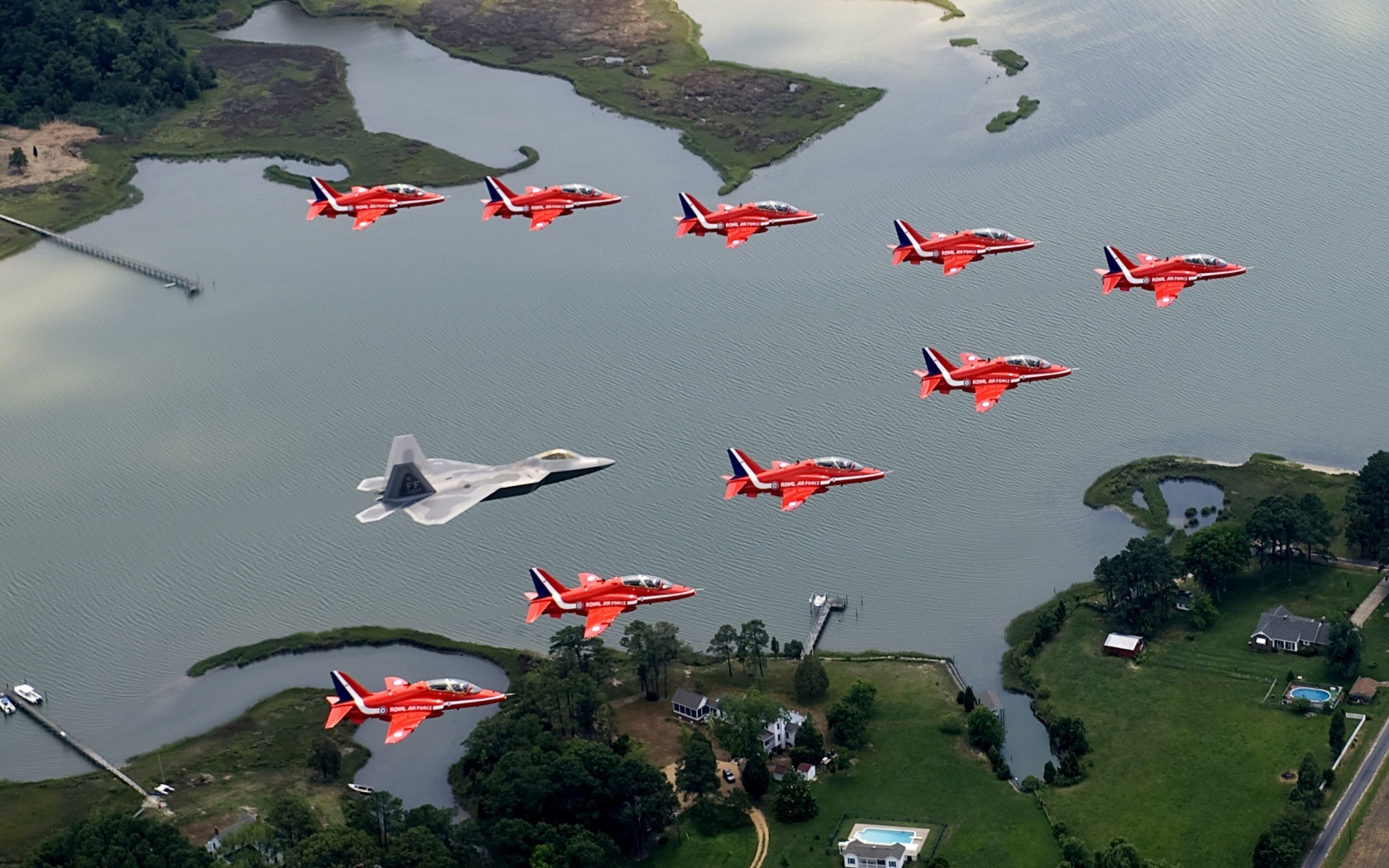 F22 And Red Arrows