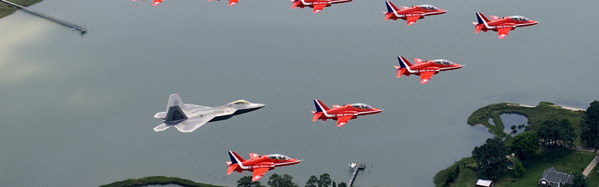 F22 And Red Arrows