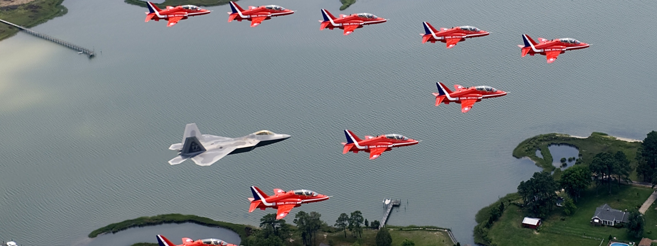 F22 And Red Arrows