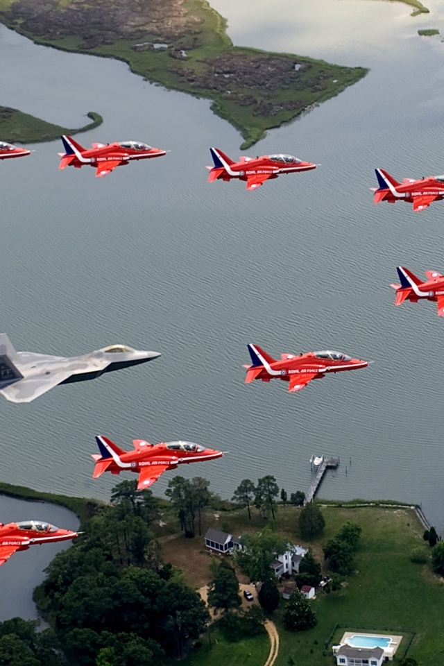 F22 And Red Arrows