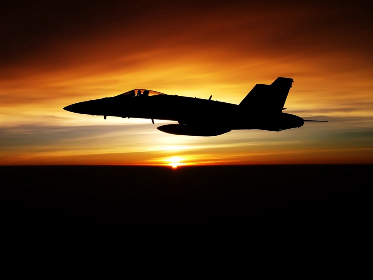 Fighter Flying In Dusk Sky