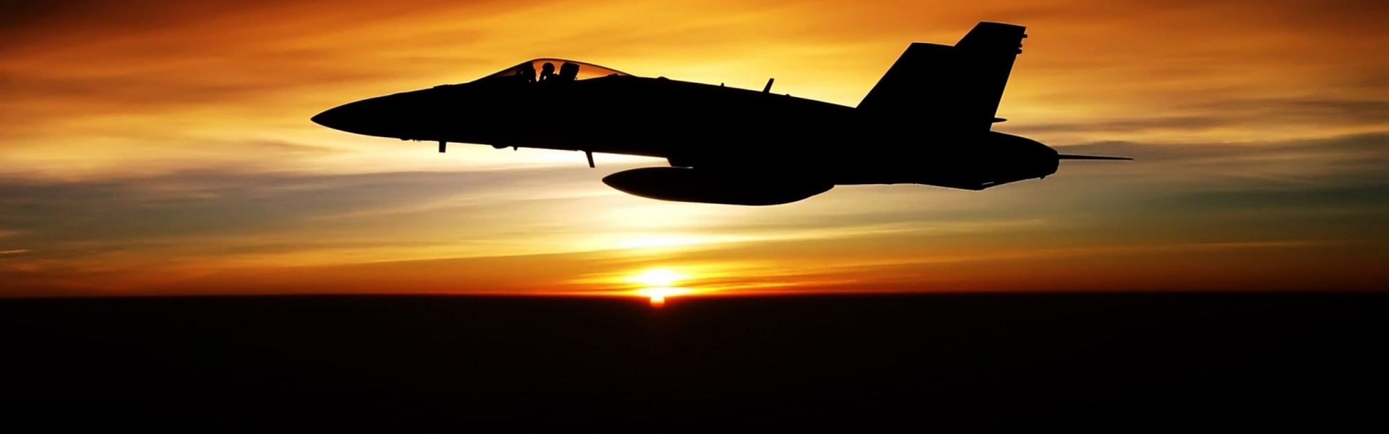 Fighter Flying In Dusk Sky