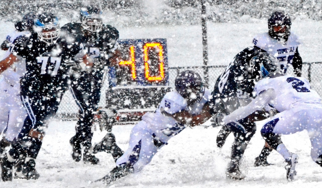 Football Match on a Snowy Blizzard