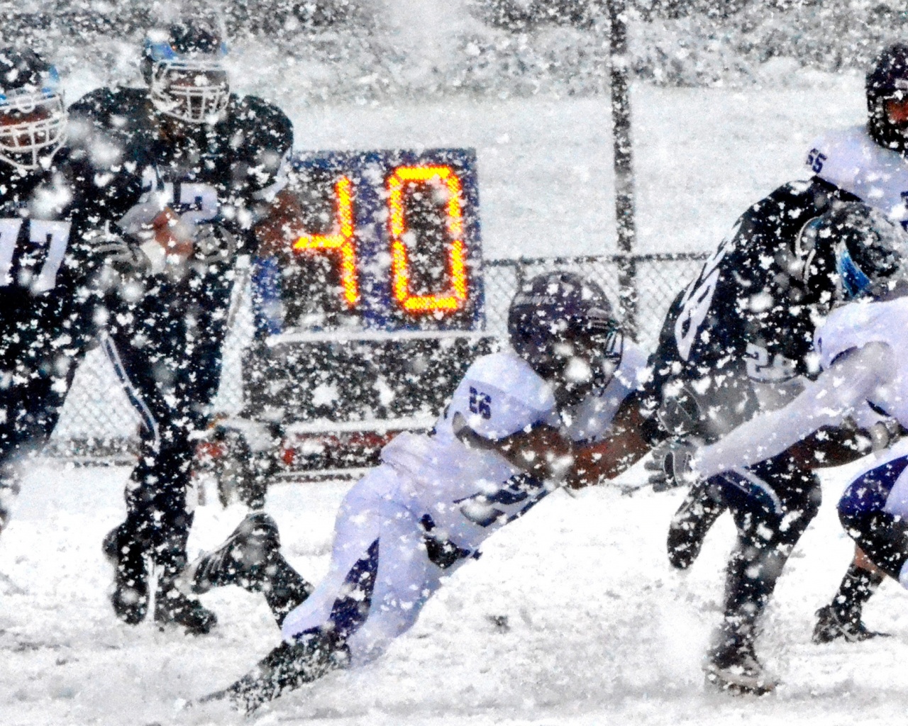 Football Match on a Snowy Blizzard