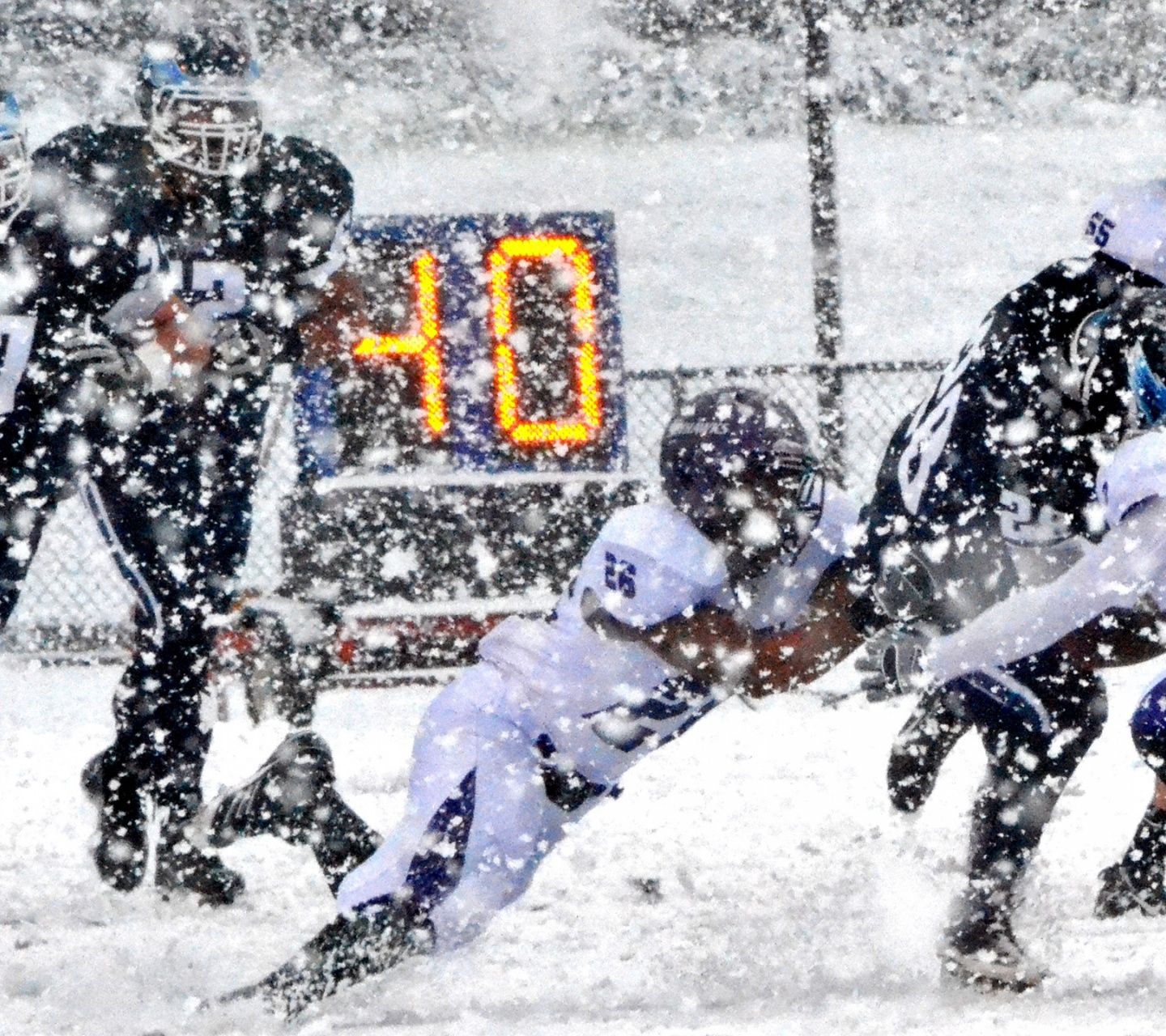 Football Match on a Snowy Blizzard