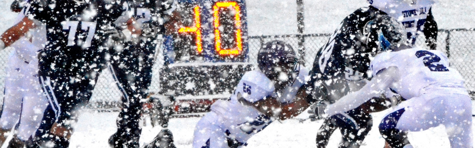 Football Match on a Snowy Blizzard