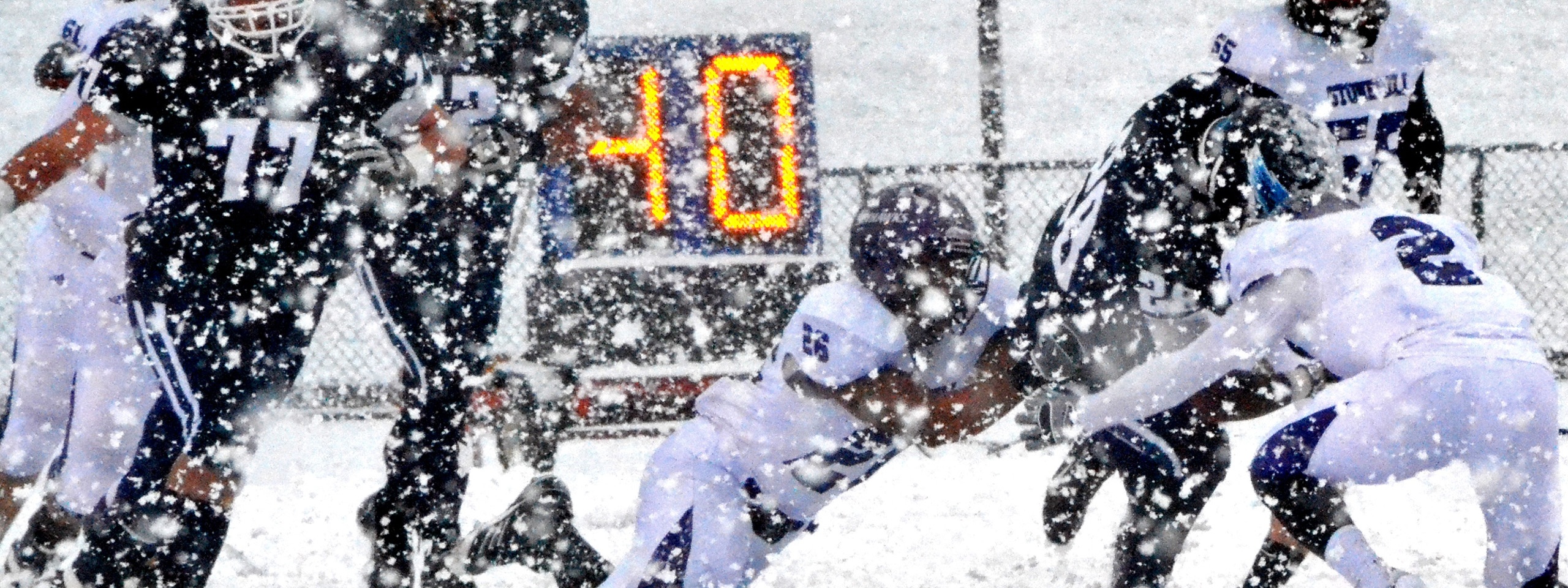 Football Match on a Snowy Blizzard