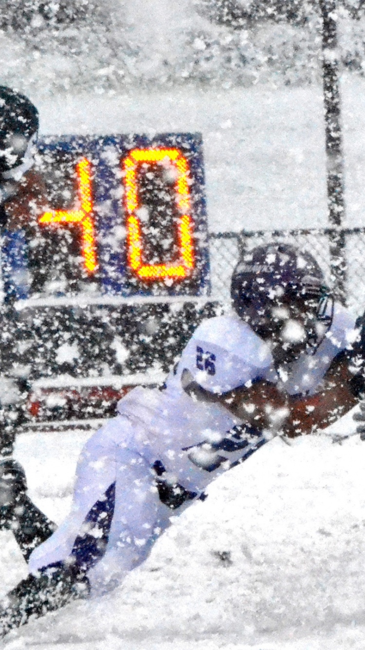 Football Match on a Snowy Blizzard