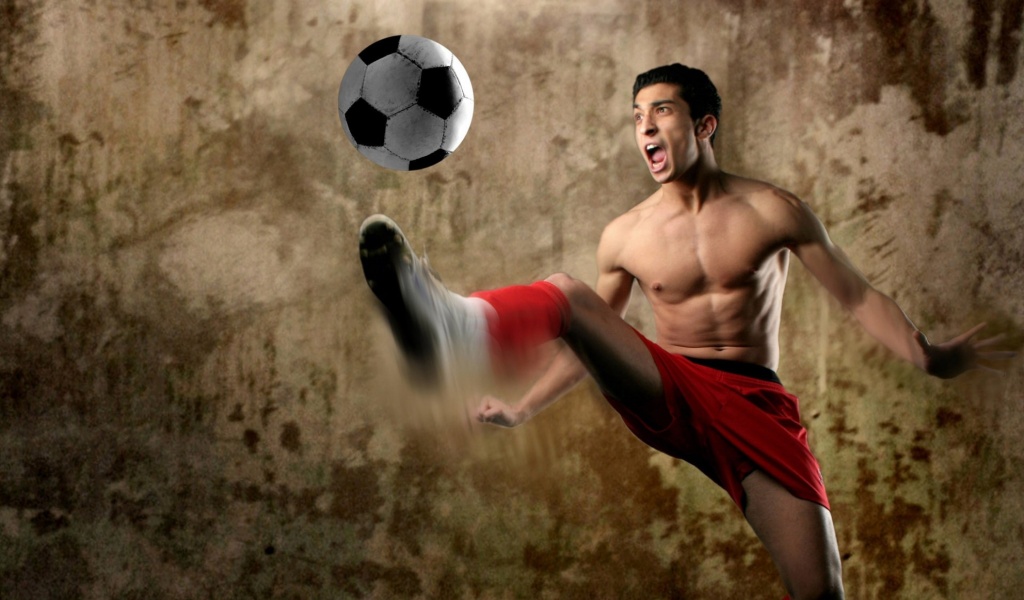 Footballer Kick A Ball