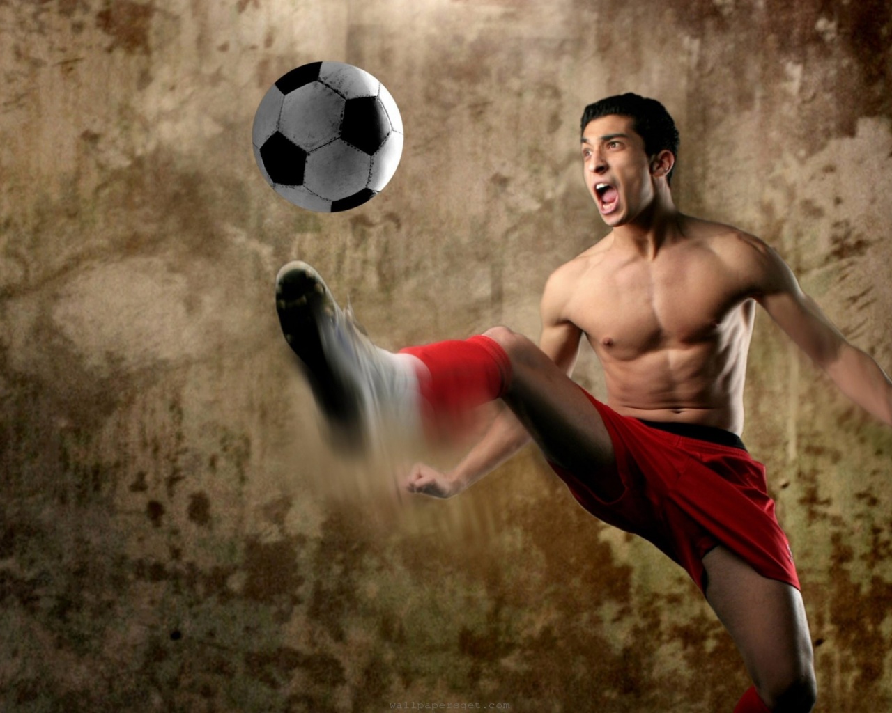 Footballer Kick A Ball