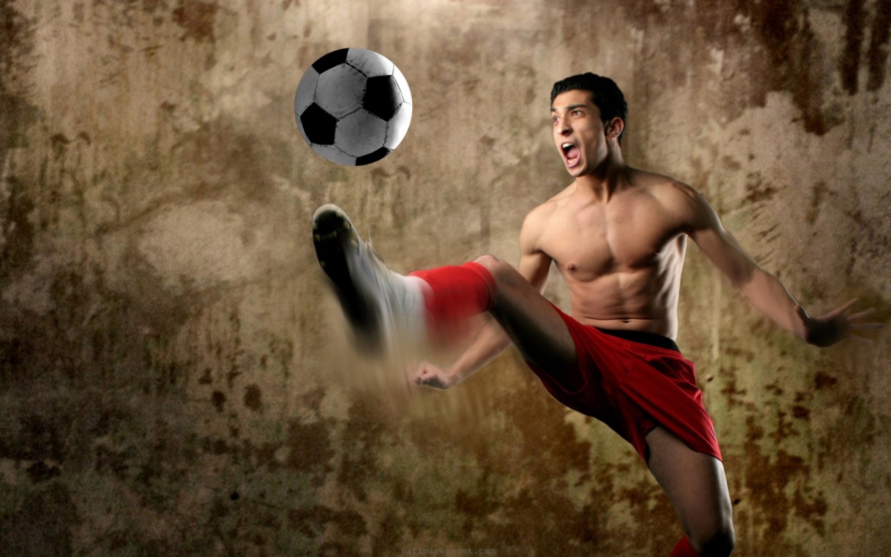 Footballer Kick A Ball