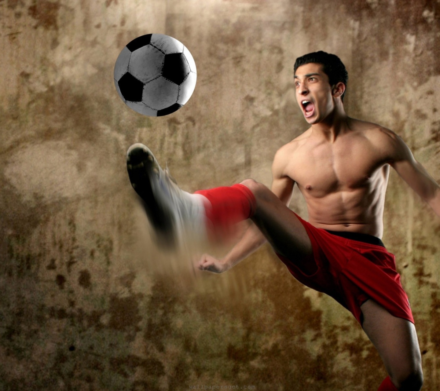 Footballer Kick A Ball