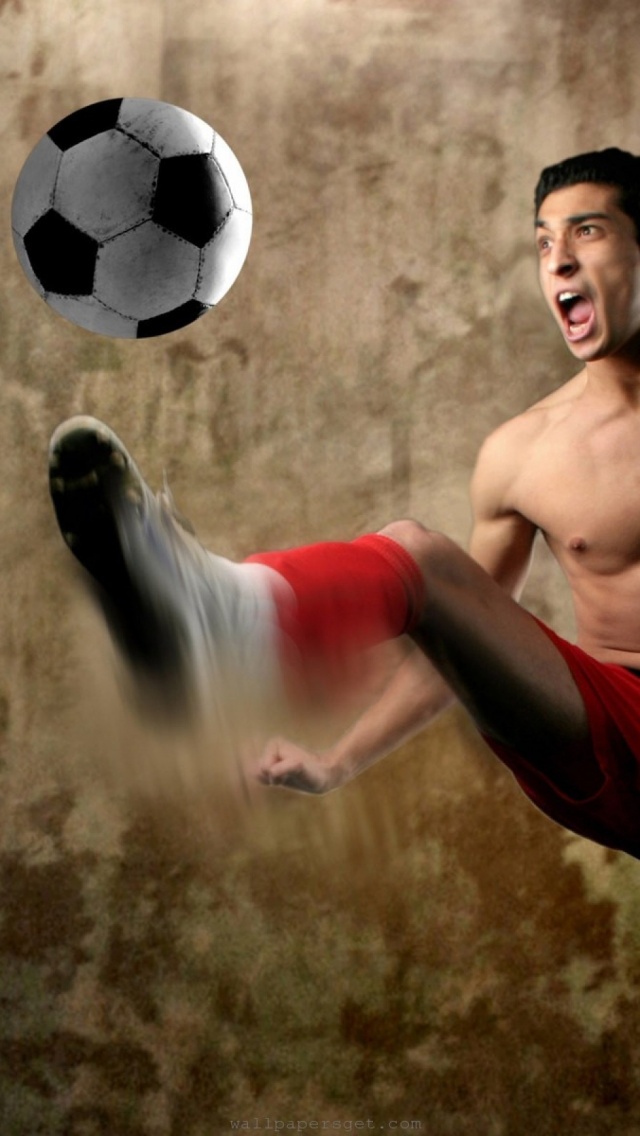 Footballer Kick A Ball