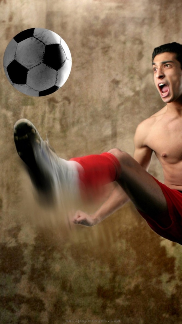 Footballer Kick A Ball