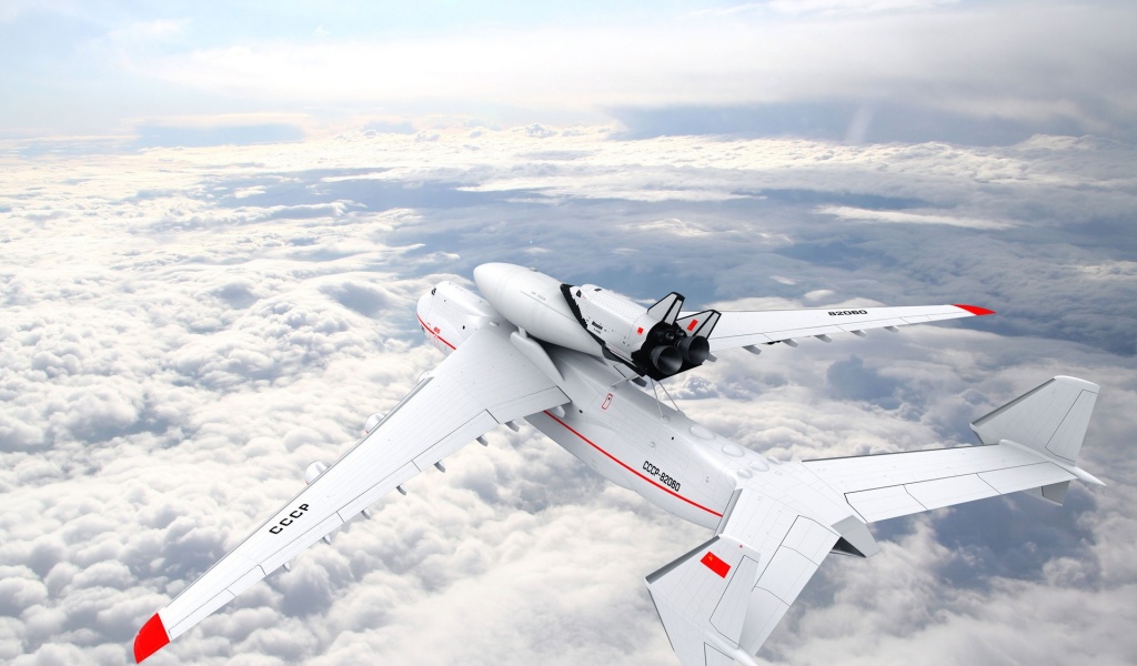 Large Aircraft Flying On The Clouds