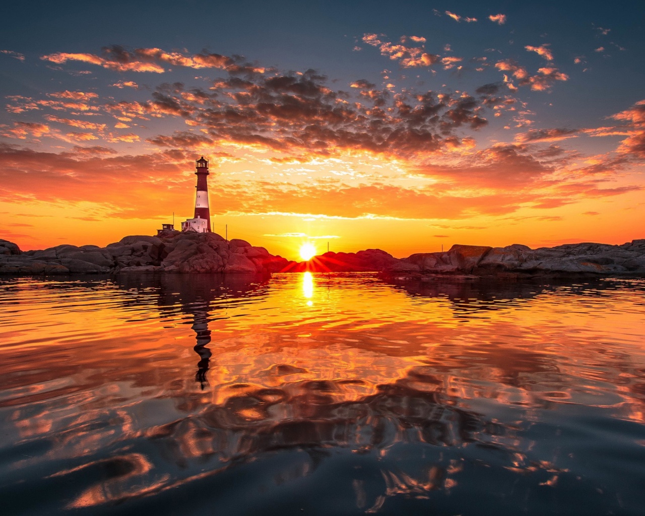 Lighthouse And Sunset