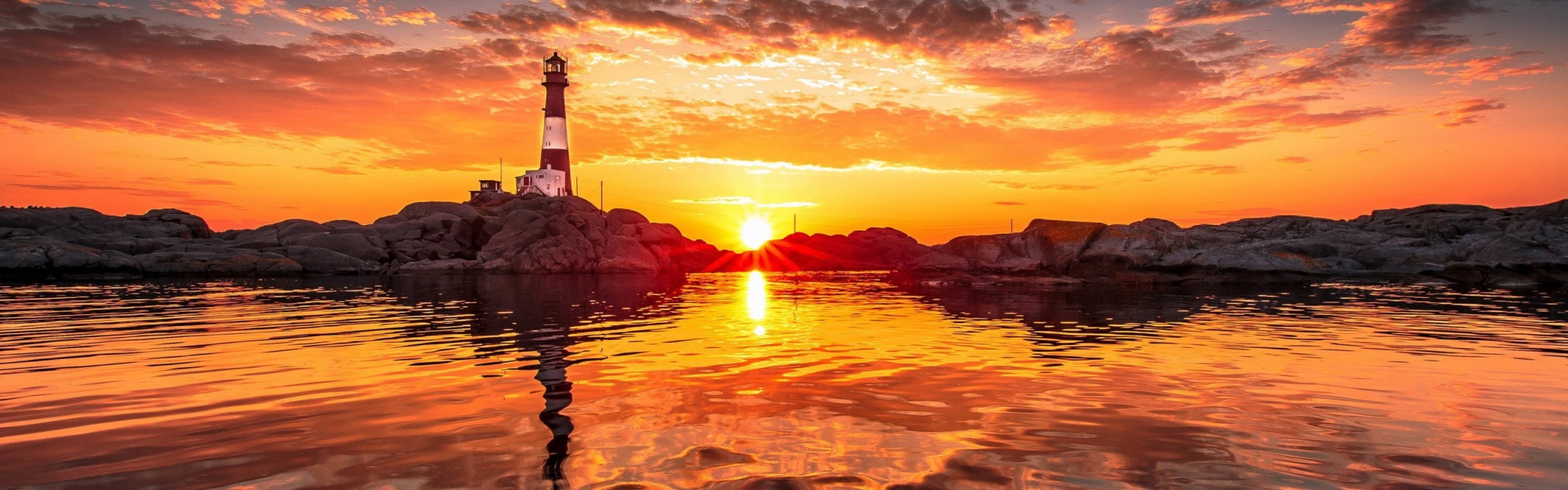 Lighthouse And Sunset