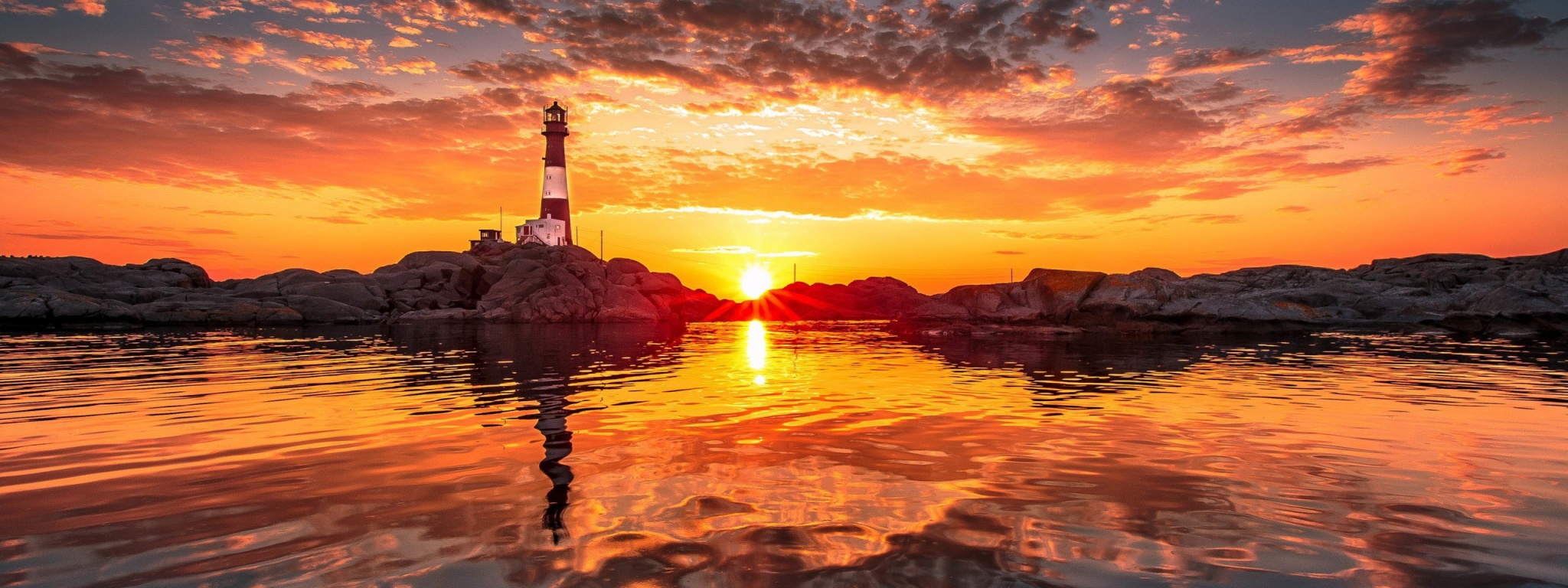 Lighthouse And Sunset