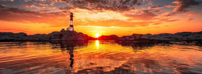 Lighthouse And Sunset