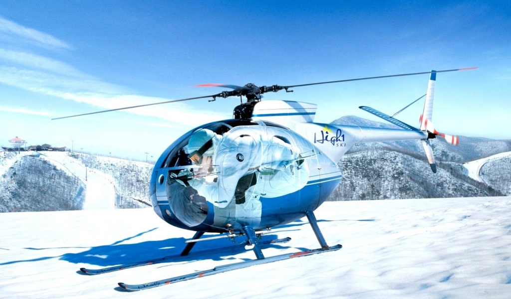 Mini Helicopters On The Snow Capped Mountain