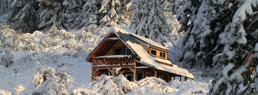 Mountain House Covered With Snow