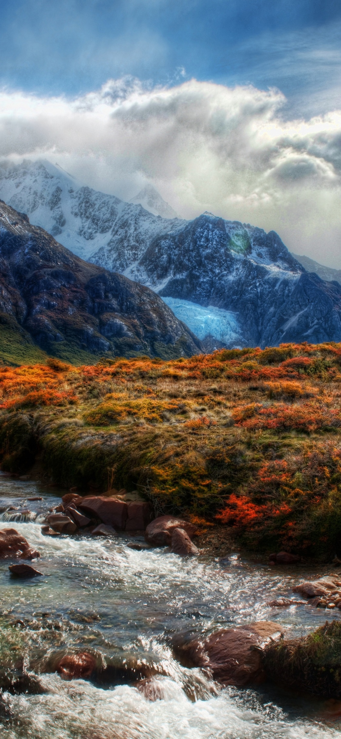 Mountain Peaks In Clouds