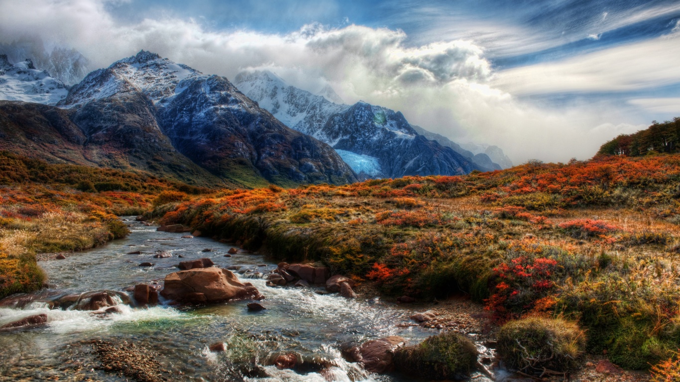 Mountain Peaks In Clouds