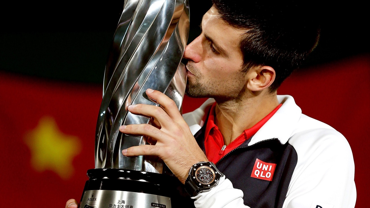 Novak Djokovic Kisses The Trophy