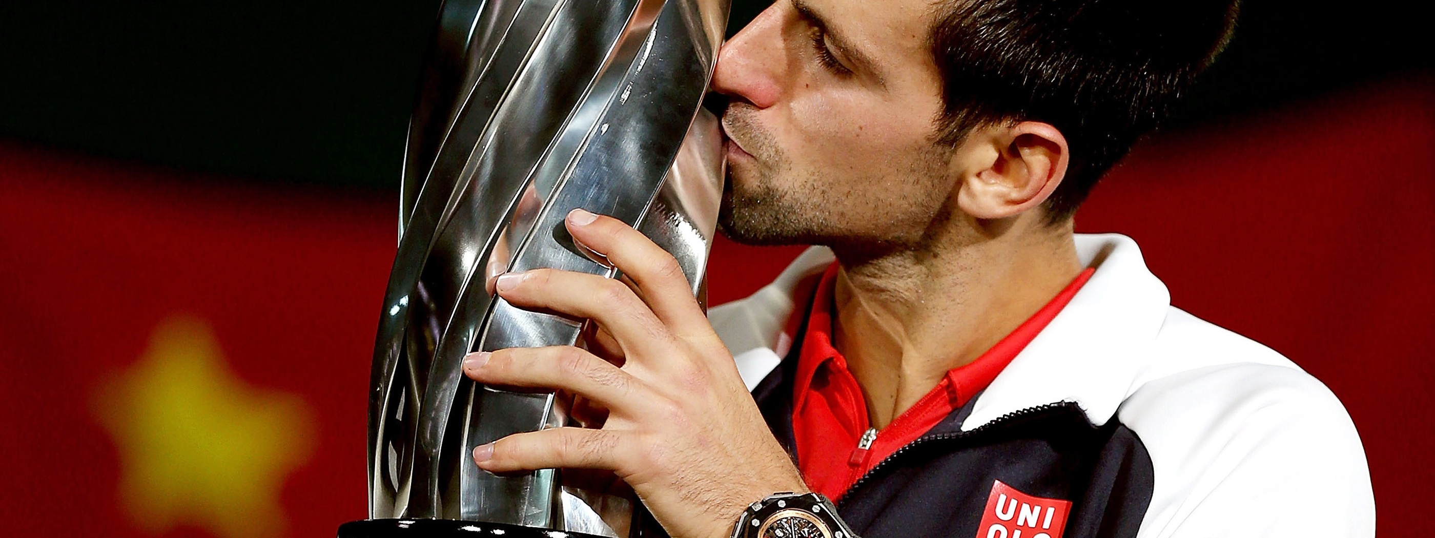 Novak Djokovic Kisses The Trophy