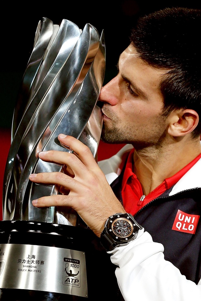 Novak Djokovic Kisses The Trophy