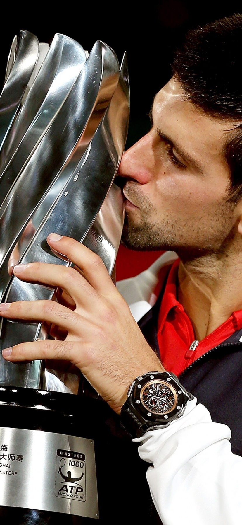 Novak Djokovic Kisses The Trophy