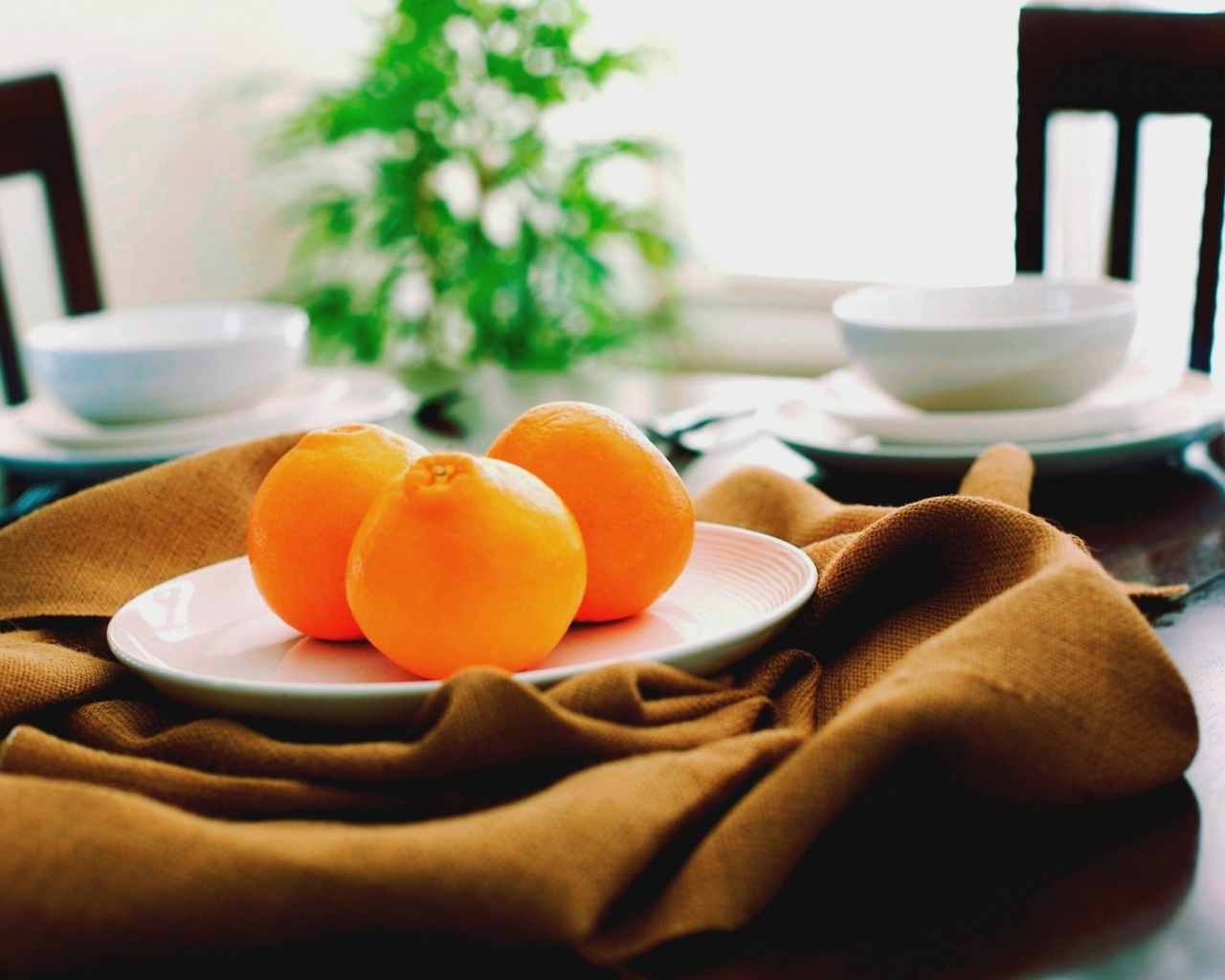 Oranges On A Plate