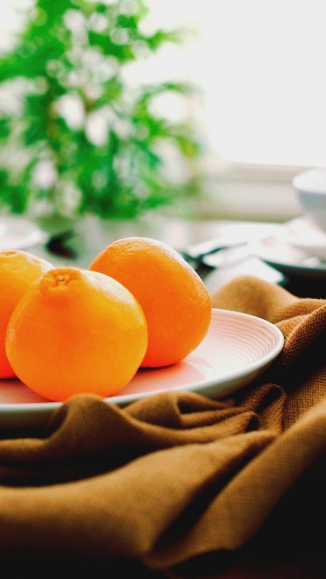 Oranges On A Plate