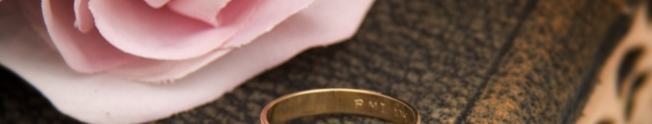 Pink Rose And Two Wedding Rings