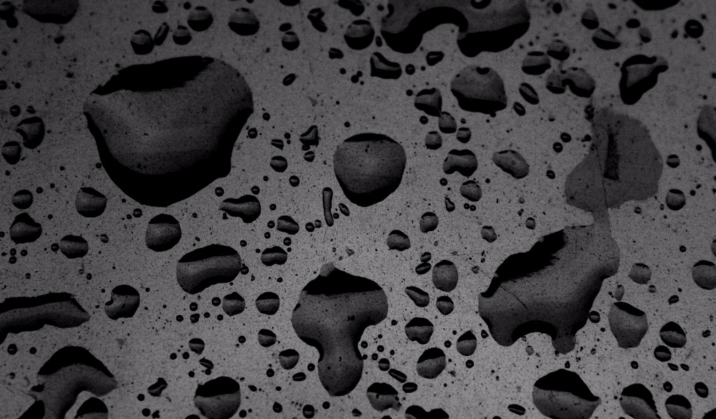 Puddled Water On Speckled Surface Texture