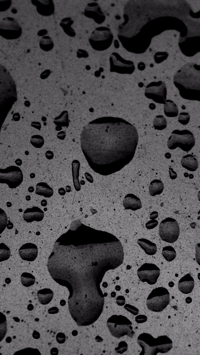 Puddled Water On Speckled Surface Texture