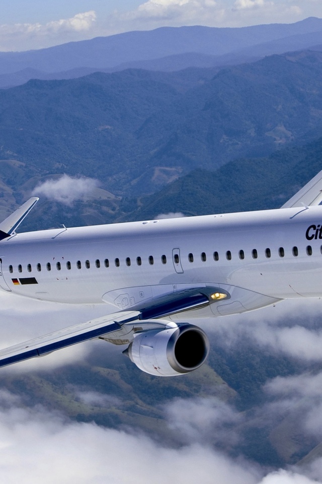 Sky With White Clouds Passenger Aircraft