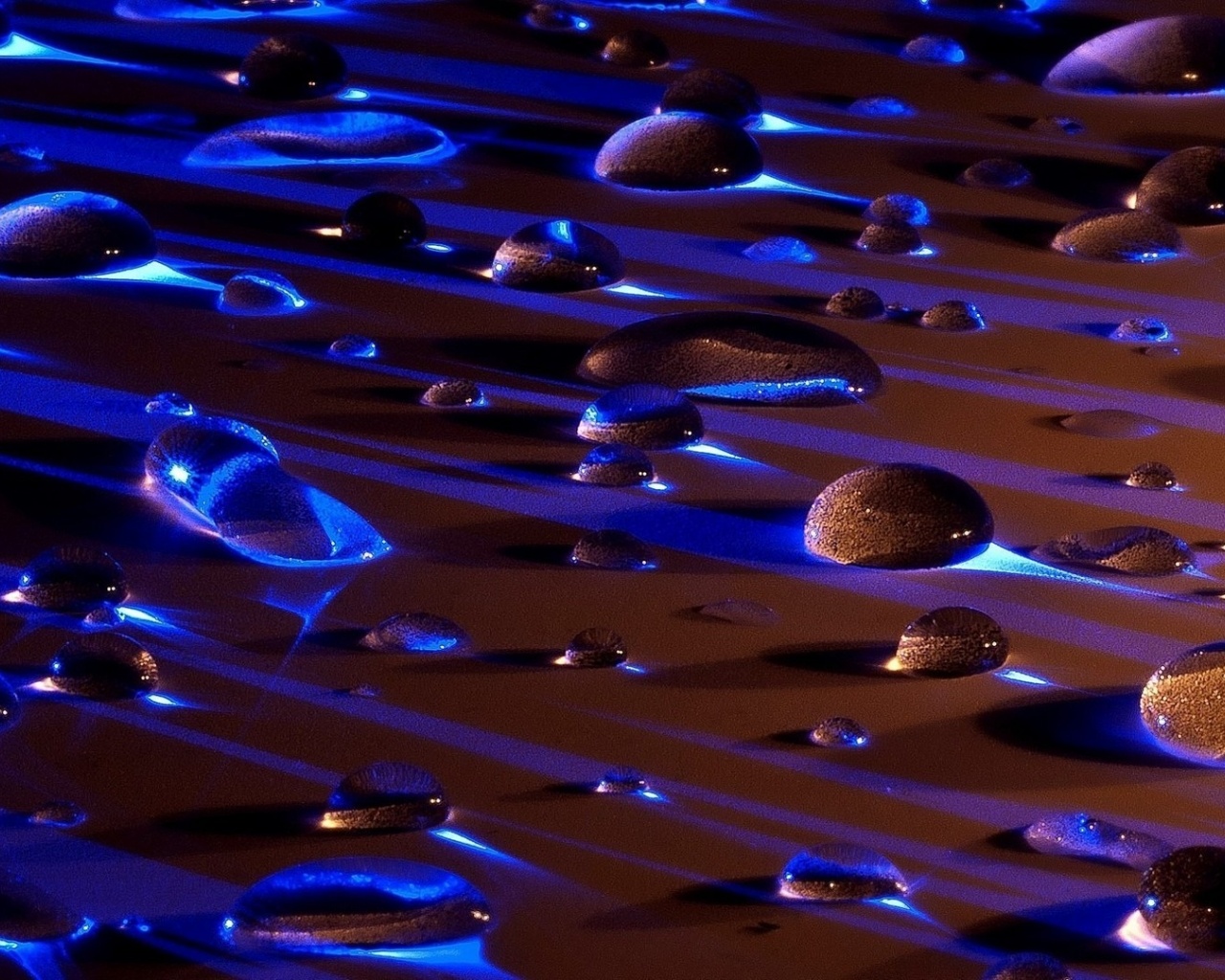 Water Drops In Blue Light