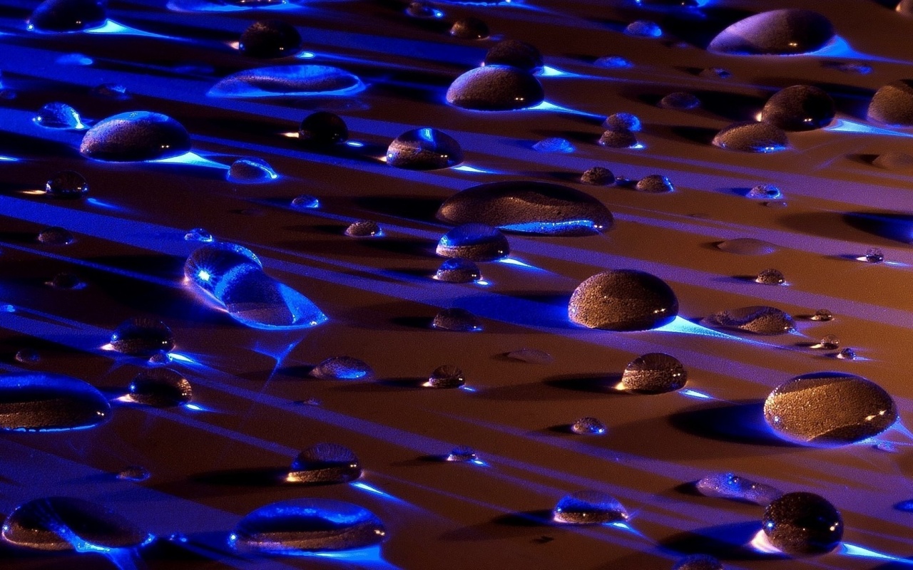 Water Drops In Blue Light