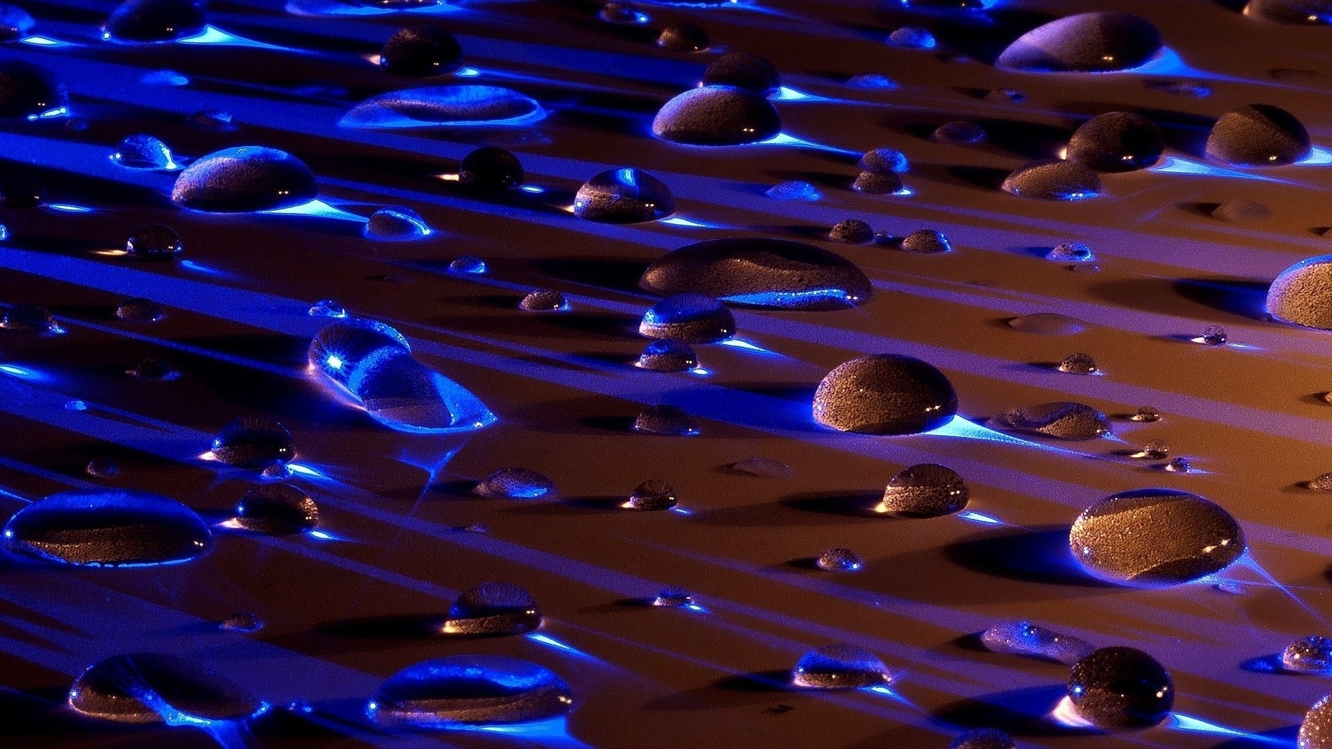 Water Drops In Blue Light