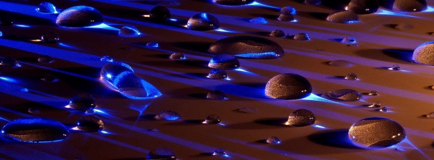 Water Drops In Blue Light