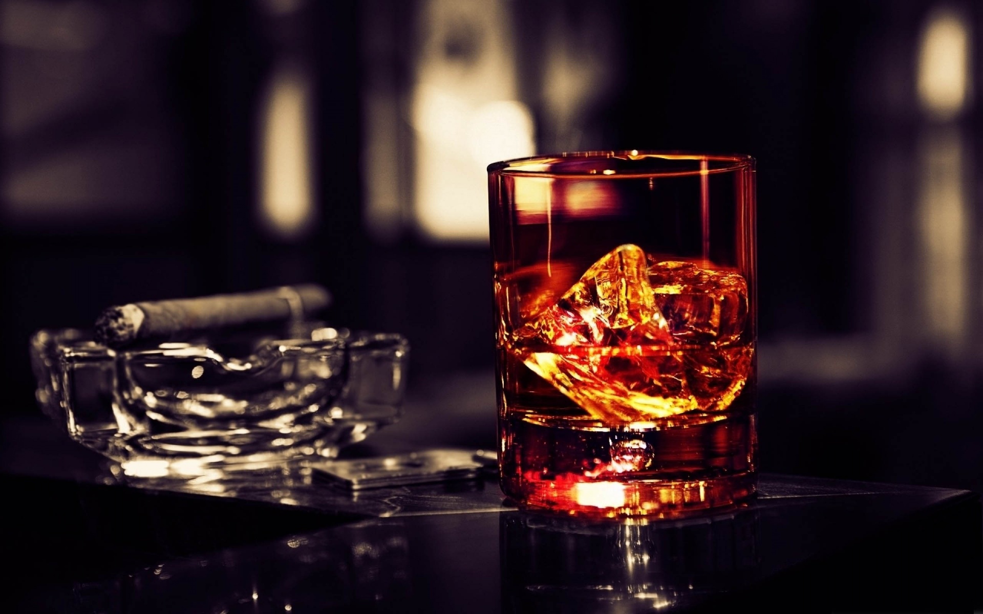 Whisky Glass With Cigar On The Table