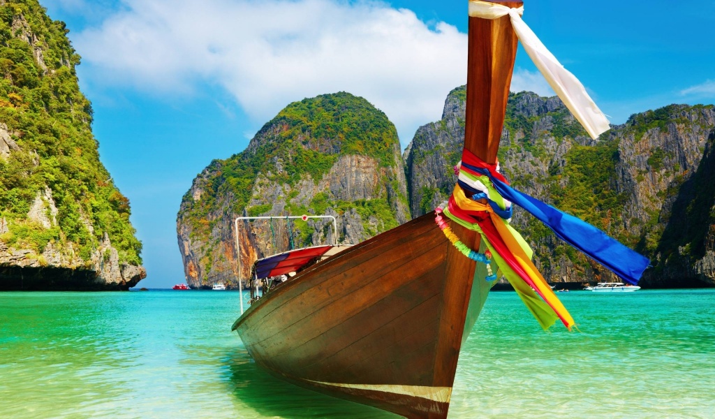 Wooden Boat On Beach